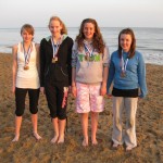 Llantwit Major Juniors with medals on Beach
